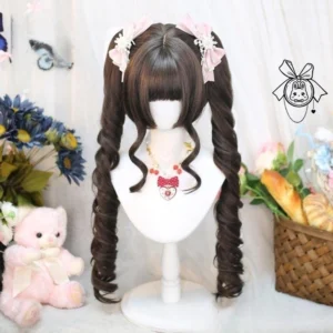 Cold brown detachable twin curly ponytail Lolita wig with blunt bangs displayed on mannequin, featuring long spiral curls and pink bow flower hair clips against pastel backdrop