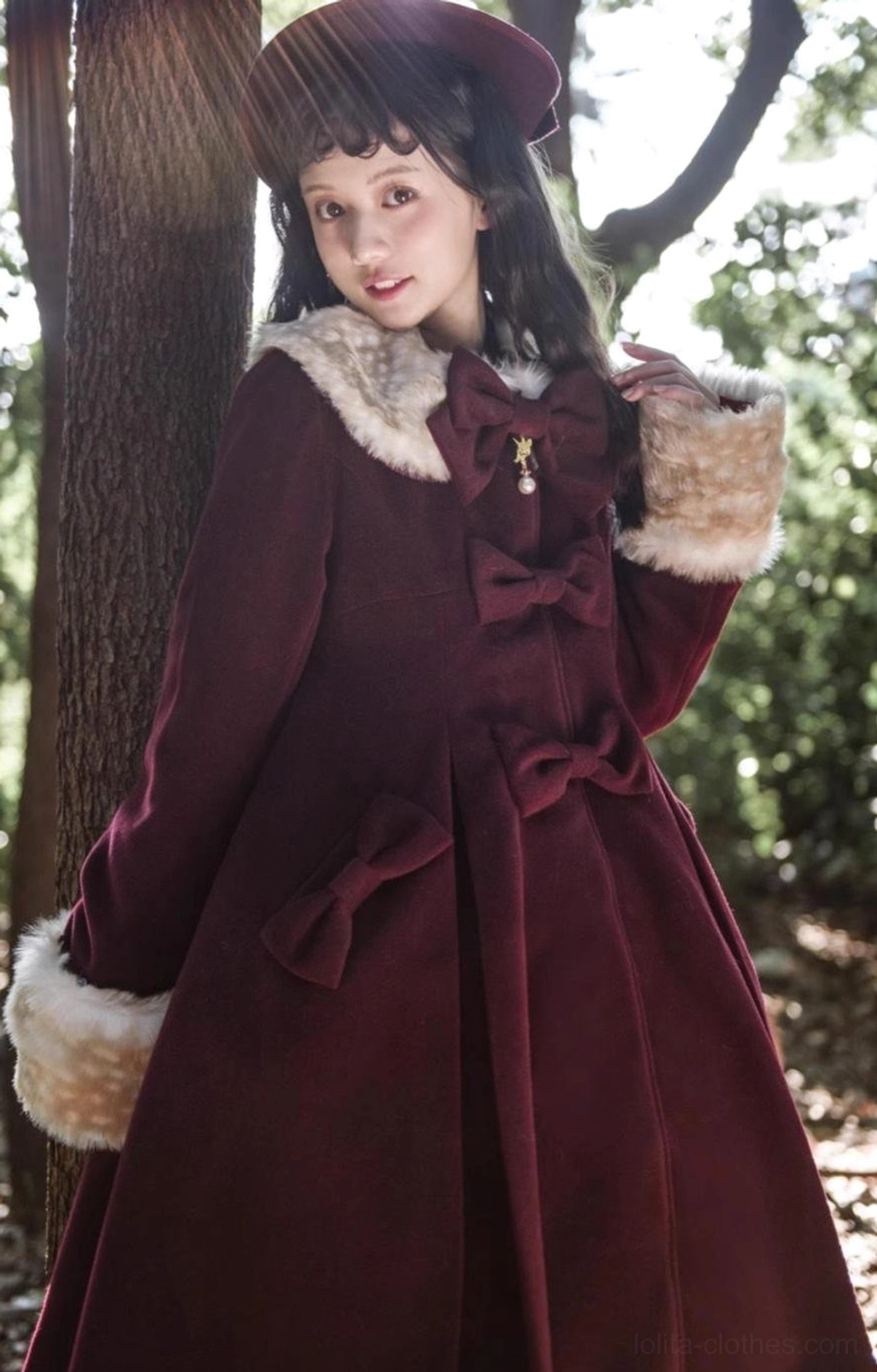Dark wine red lolita overcoat half-body side profile showing waist detail faux fur trim A-line silhouette