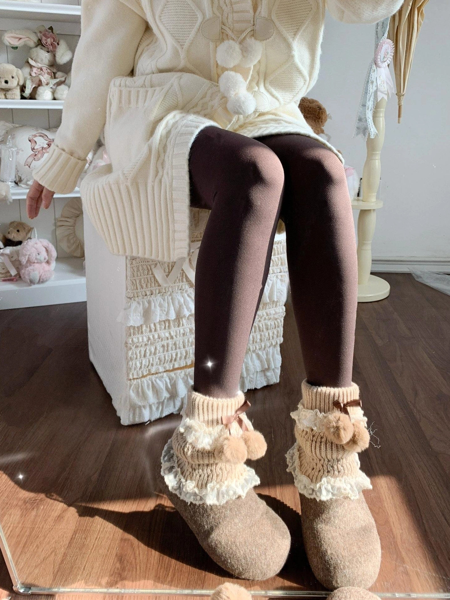 Dark coffee brown winter fleece pantyhose with beige lace leg warmers teddy bear decor and brown loafers cozy indoor wooden setting