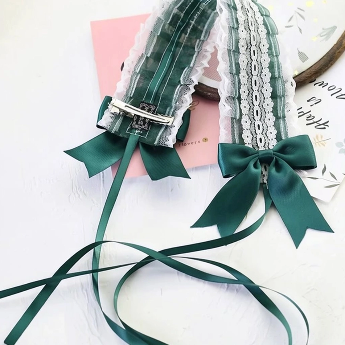Dark green lolita lace headband with satin bow featuring premium polyester construction and extended ribbon tail