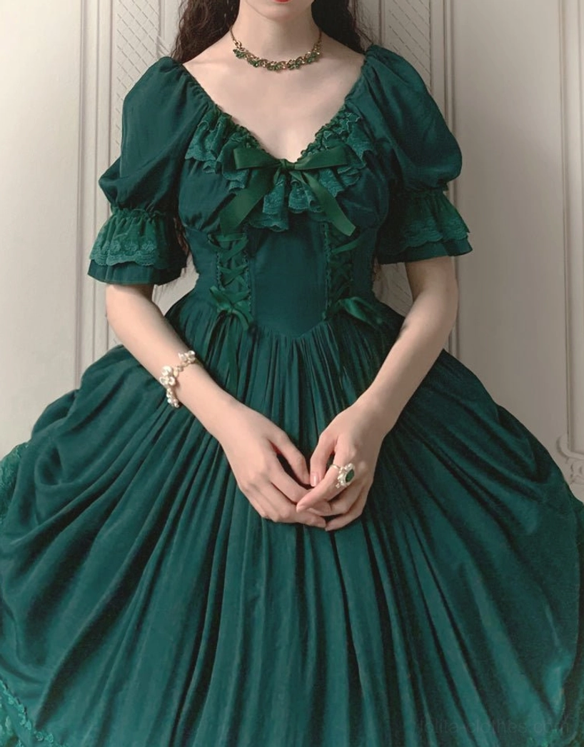 Dark green French Lolita one-piece dress styled with pearl necklace and vintage-inspired locket for refined look
