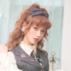 Dark grey pinstripe lace bow KC katyusha hair accessory worn by curly-haired lolita model, vintage outfit styling with elegant drop earrings, window studio lighting
