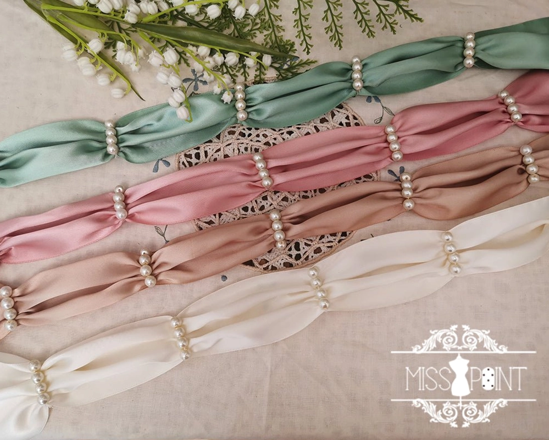 Handmade lolita ribbon belt in dark navy with pearl beading and traditional floral weaving pattern detail showcase