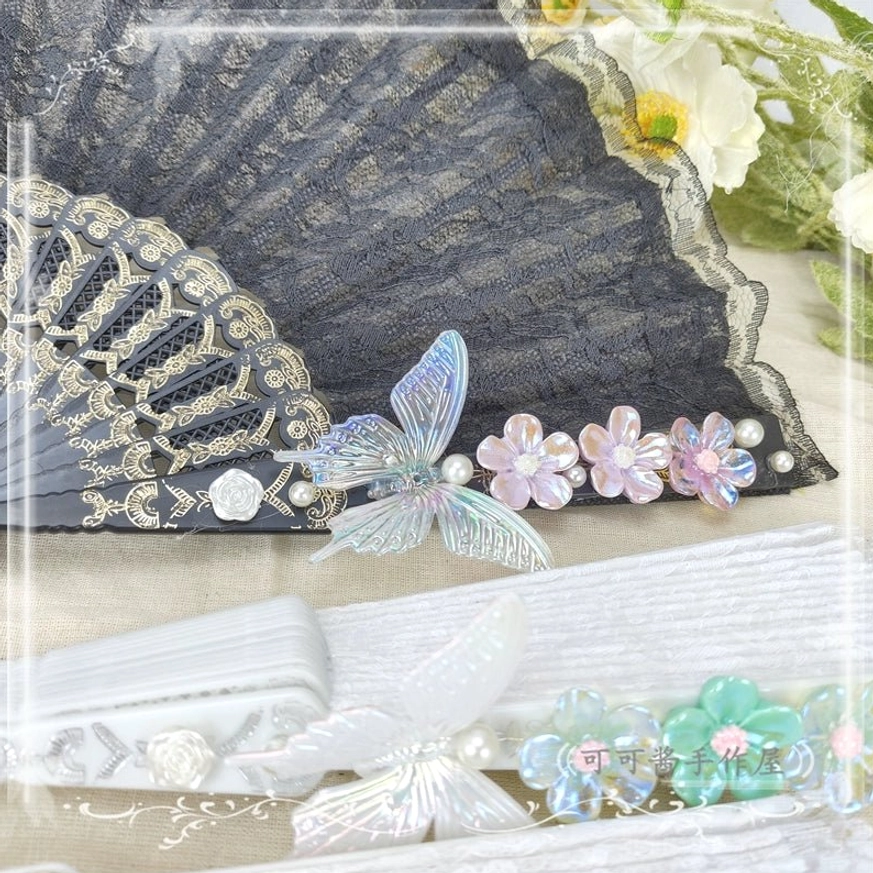 Dark purple lolita folding fan regal mysterious design with sophisticated butterfly flower embellishments perfect for hime lolita elegant evening wear