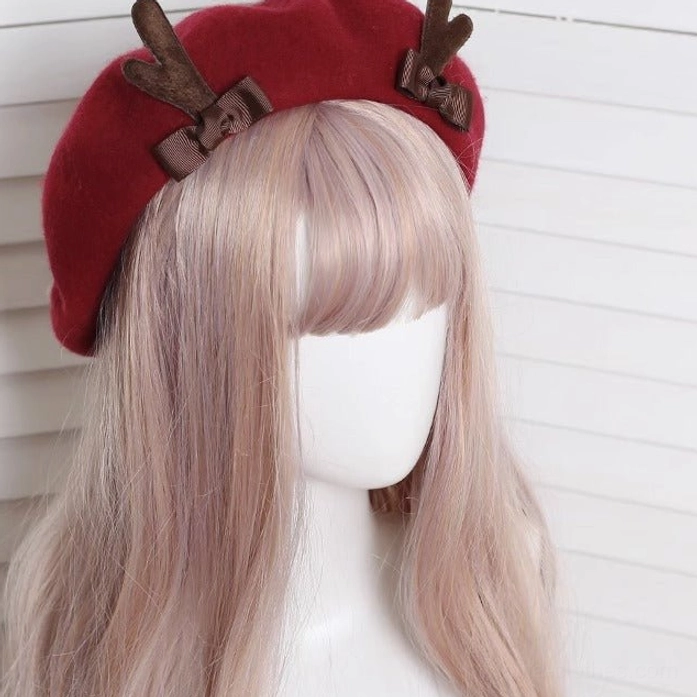 Dark red wool deer horn beret with bowknot Christmas lolita headpiece front three-quarter view on mannequin