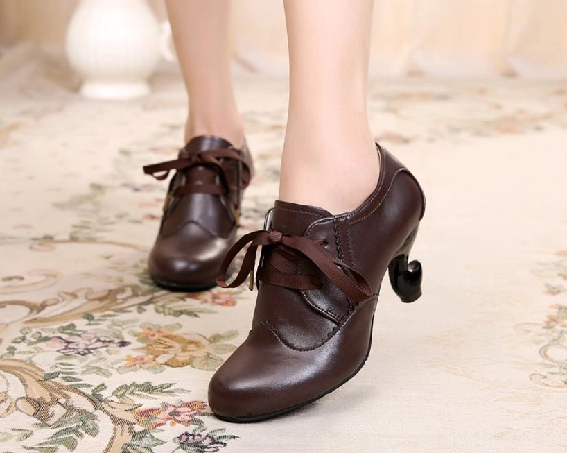Dark retro Lolita Mary Jane high heel shoes with deep mouth silhouette, curved spool heel, scalloped stitching trim, and ribbon lace closures for authentic vintage-inspired styling