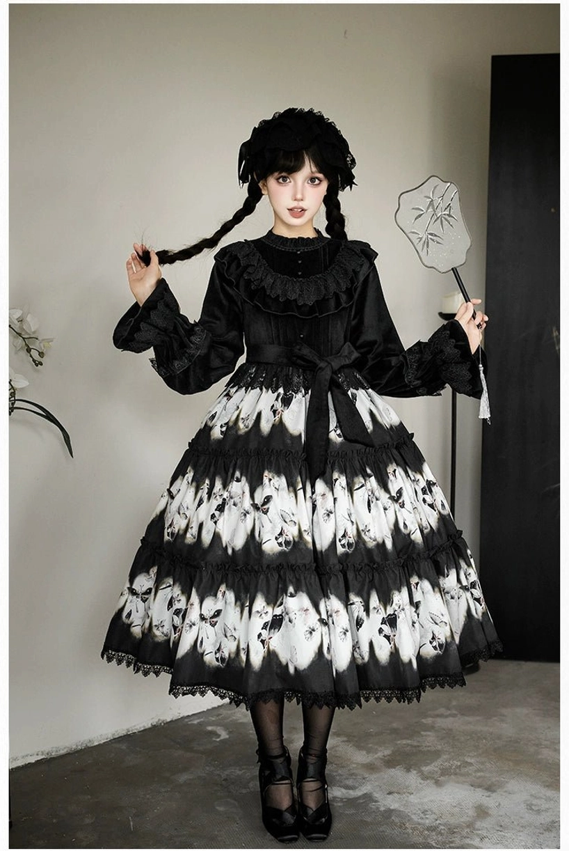 Dead leaf butterfly gothic lolita dress front full-body view model neutral studio paper fan braided twin hairstyle long ruffled sleeves tiered skirt