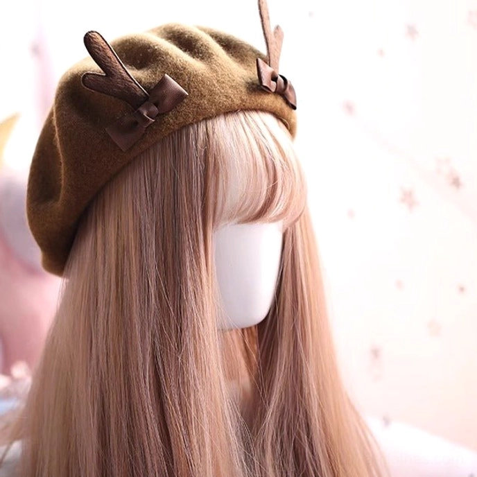 Side profile view dark brown wool deer horn beret with bow lolita Christmas headpiece fitted shape