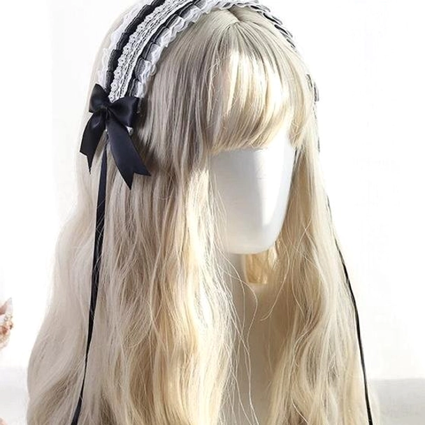 Light blue satin ribbon bow lolita headdress with delicate white lace trim and extended blue ribbon tail detail