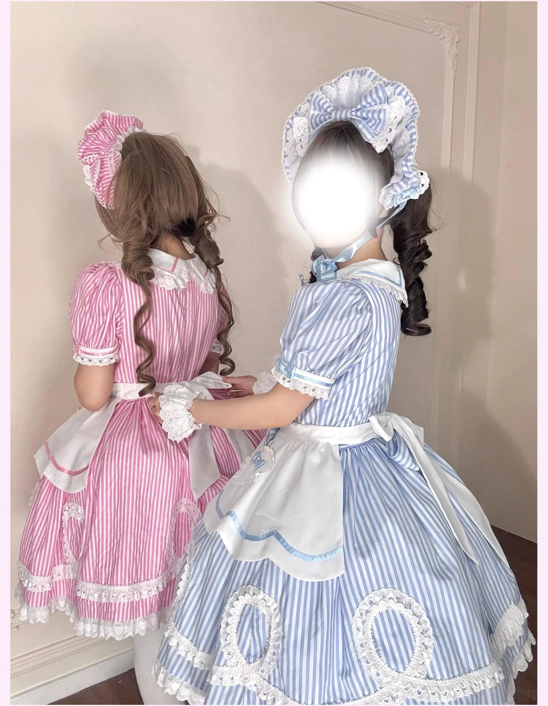 Close-up shot of detachable apron showing construction quality and coordinated color matching with dress