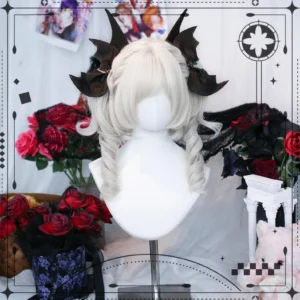 Side profile view of white spiral curly double ponytail lolita wig with black bat bows, showing curl texture and hair volume on white mannequin head with gothic floral backdrop