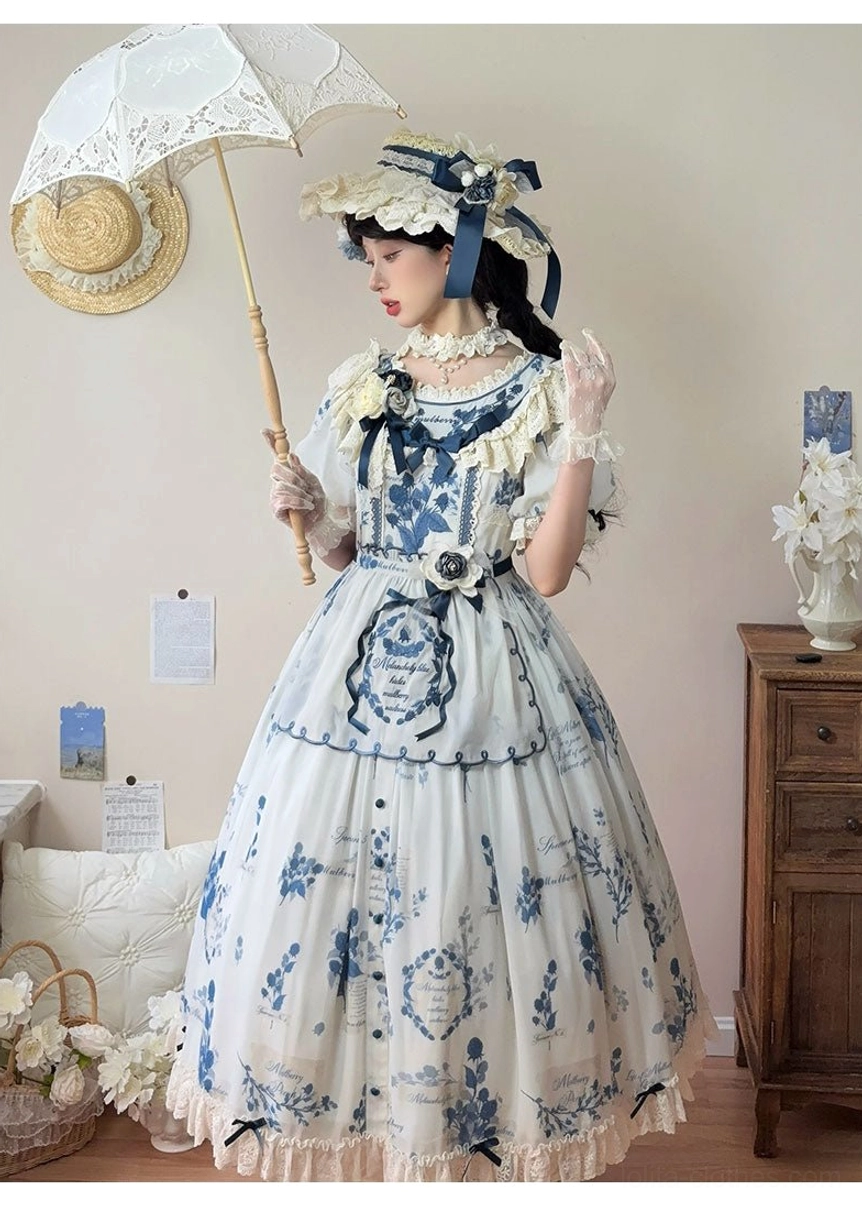 Detachable shoulder bow pins displayed separately showing removable customization feature for two-piece Lolita camisole set