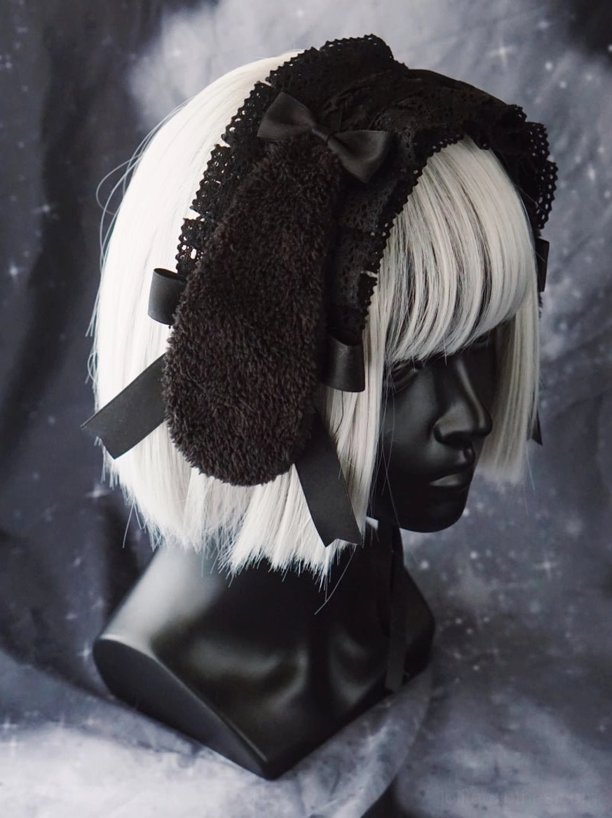 Dimensional wing ornaments and satin bow gothic lolita hairband showing detailed craftsmanship and design precision for visual impact