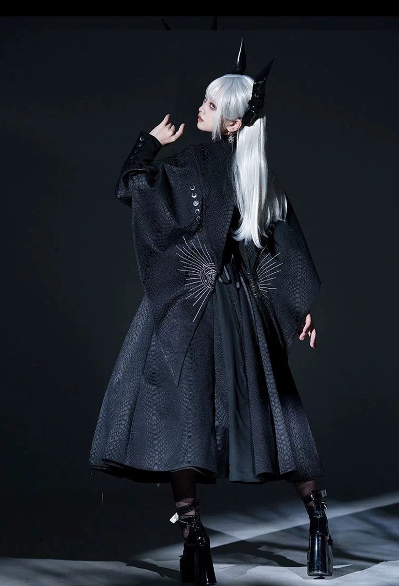 Black flared Gothic coat with silver radial back print and high-waisted silhouette side back angle