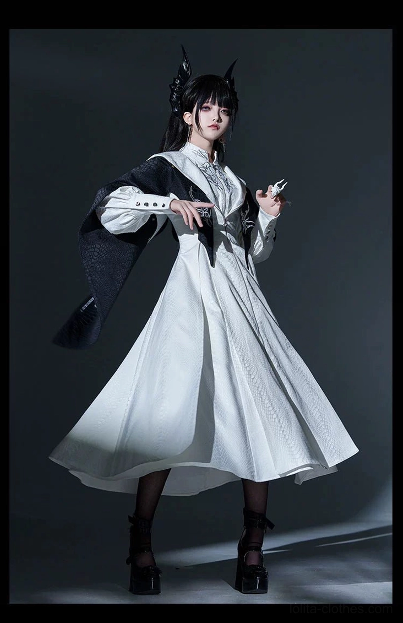 Gothic Lolita JSK and coat ensemble showing cinched waist and A-line silhouette proportions side profile