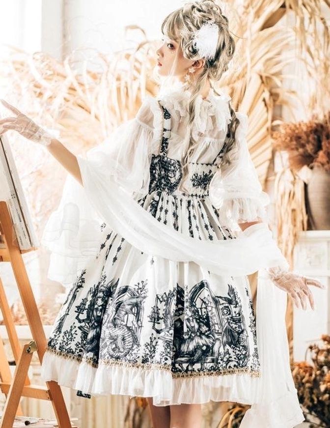 White Dragon Witch Gothic Lolita JSK Dress back view showing full tiered ruffled skirt, cascading tulle layers, and black vintage printed patterns