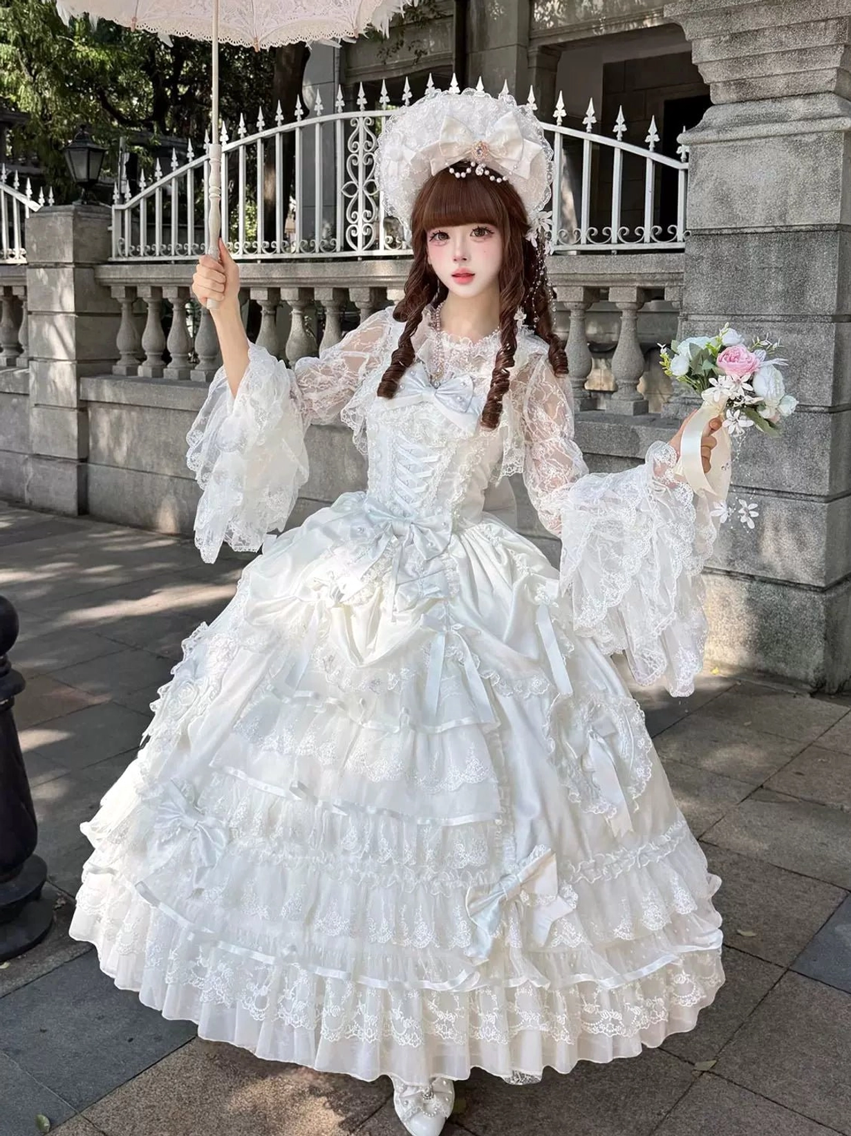 Drapery Poem sweet wedding Lolita JSK dress back view with tiered lace ruffle skirt, back trailing bow accent, showing silhouette and skirt volume in full length
