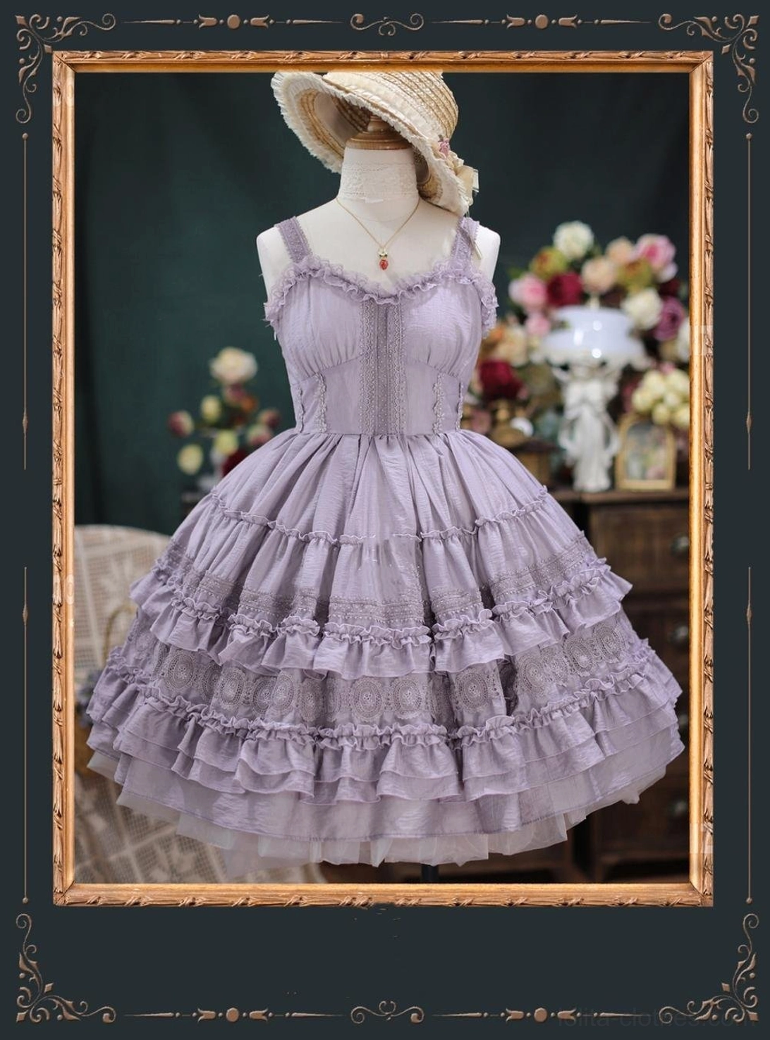 Lavender purple lolita JSK with spaghetti straps, fitted lace-trimmed bodice, and flared tiered ruffled tulle skirt on dress mannequin with straw boater hat in vintage floral indoor scene