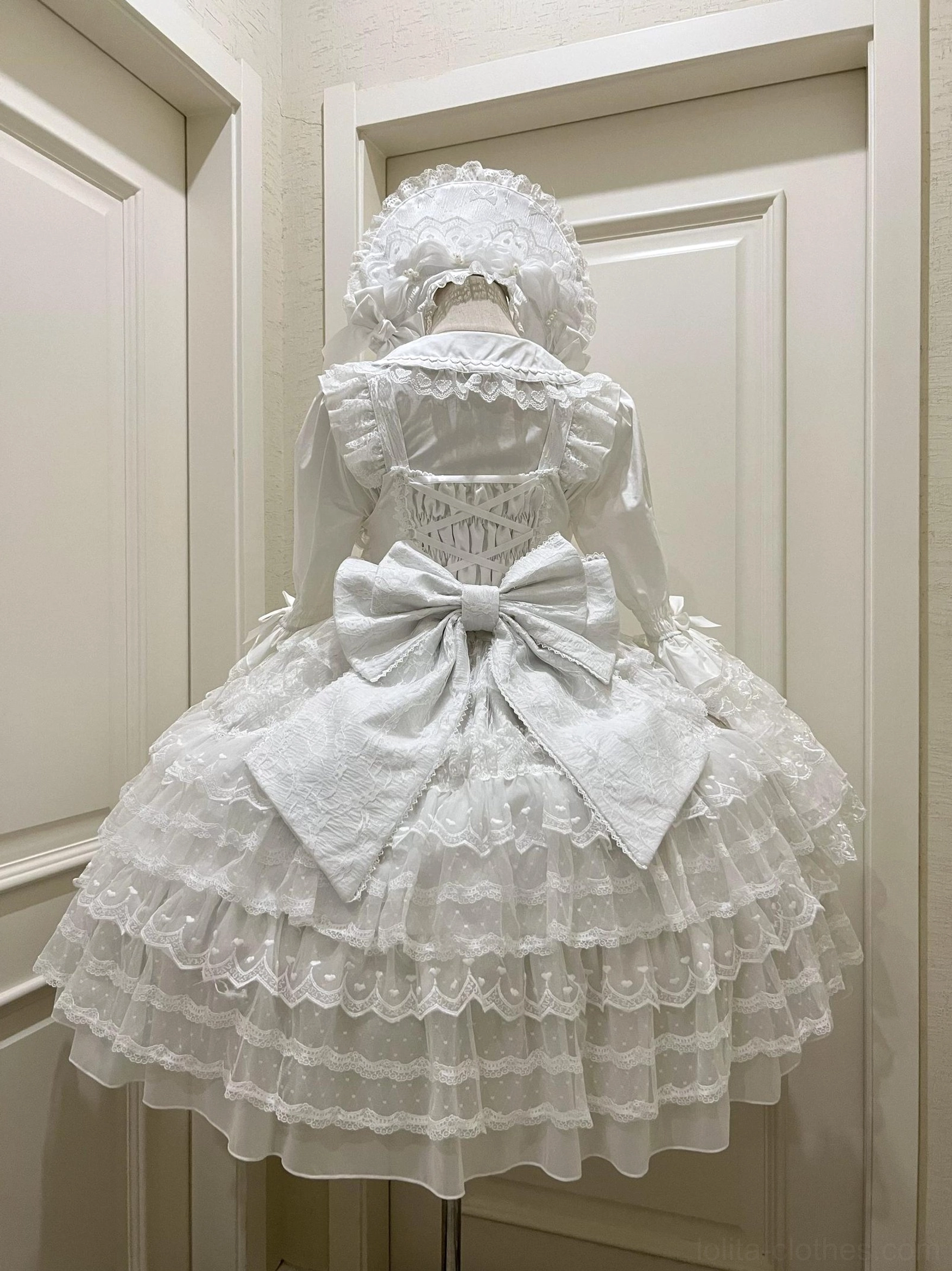 Dream Prelude princess Lolita JSK dress detail shot showing pearl decorations and lace-up back construction close-up