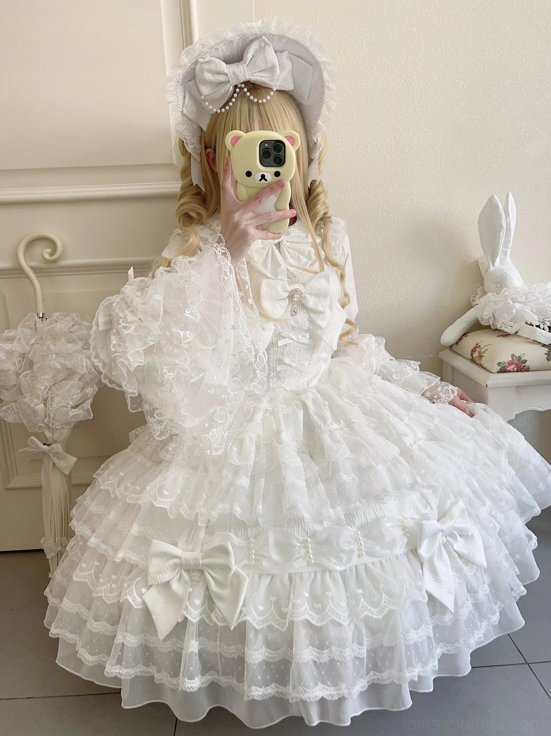 Dream Prelude Lolita dress photography showcase displaying tiered ruffles pearl details and romantic aesthetic full length