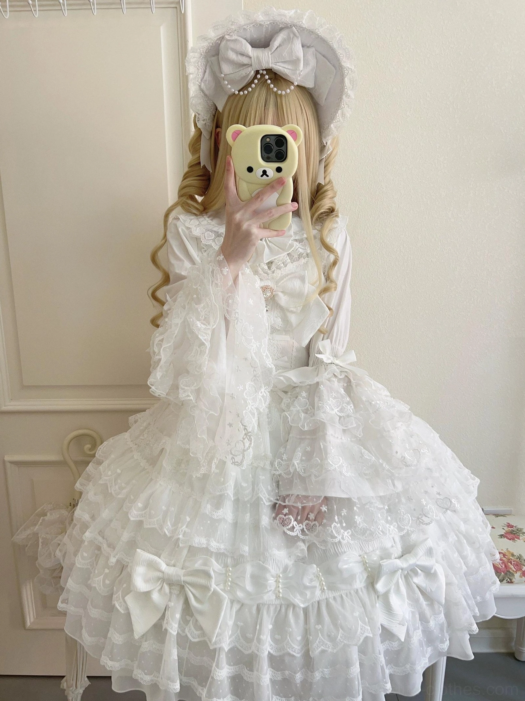Dream Prelude Lolita JSK dress polyester fabric drape and sheen showing ethereal aesthetic in indoor studio lighting