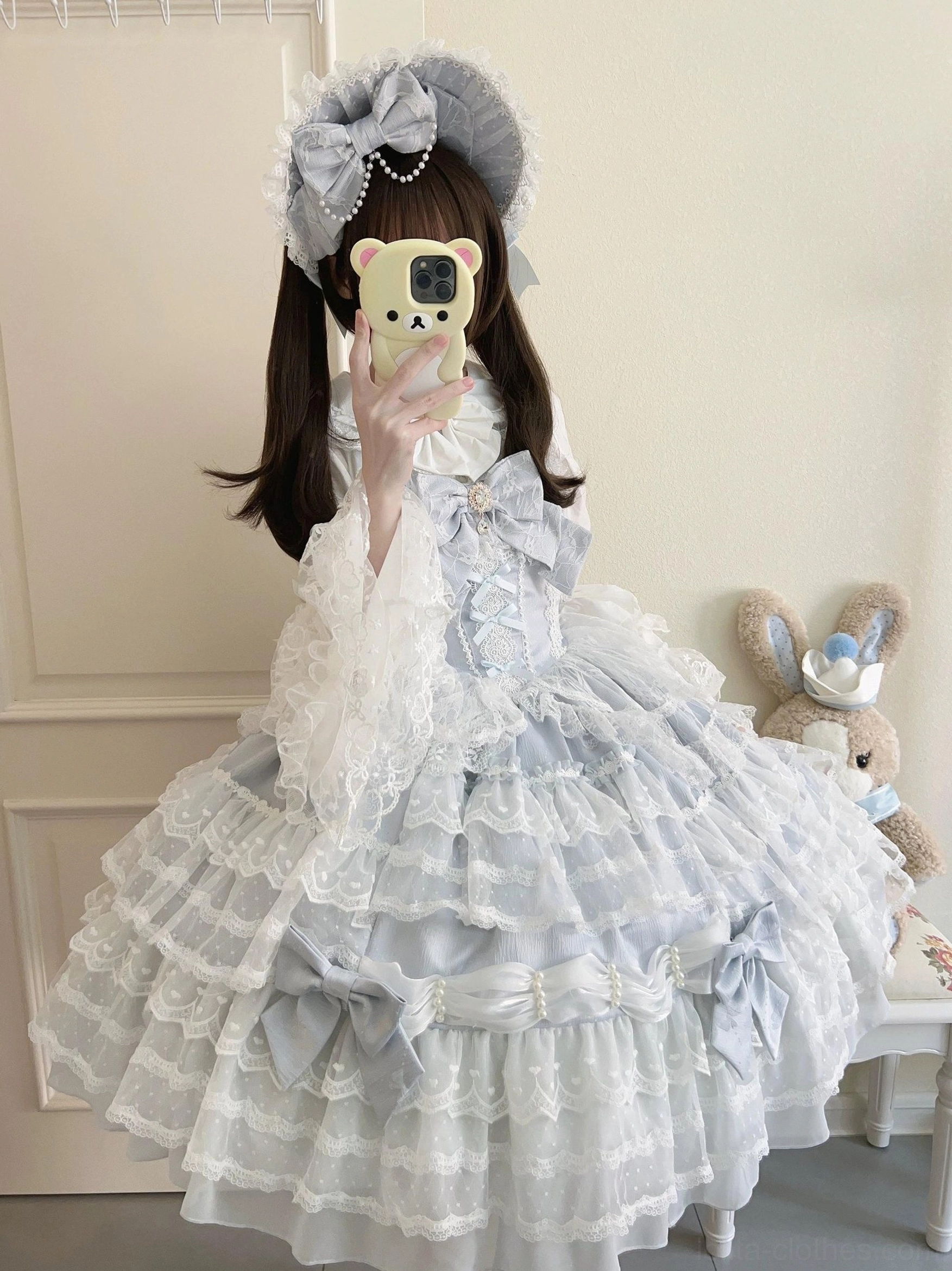 Dream Prelude Lolita JSK dress tiered ruffled skirt detail showing layered lace construction and hem bow attachment