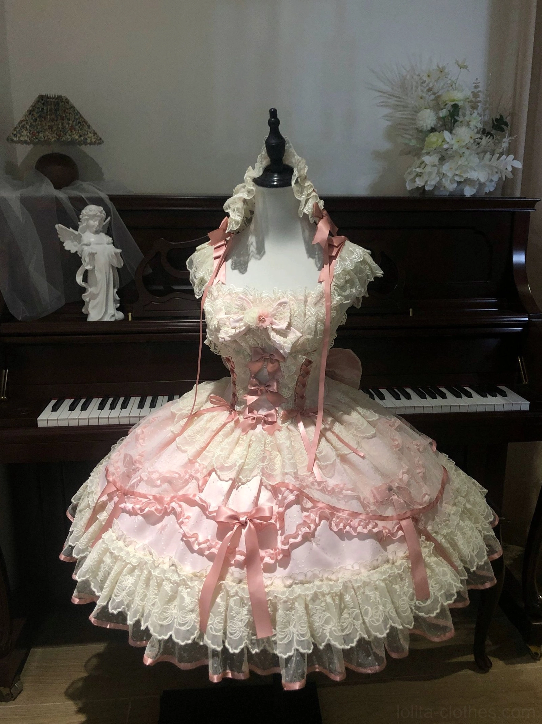Sweet lolita jumper skirt paired with coordinating white blouse and lace headband showing complete ensemble coordination and styling recommendations for lolita meetups