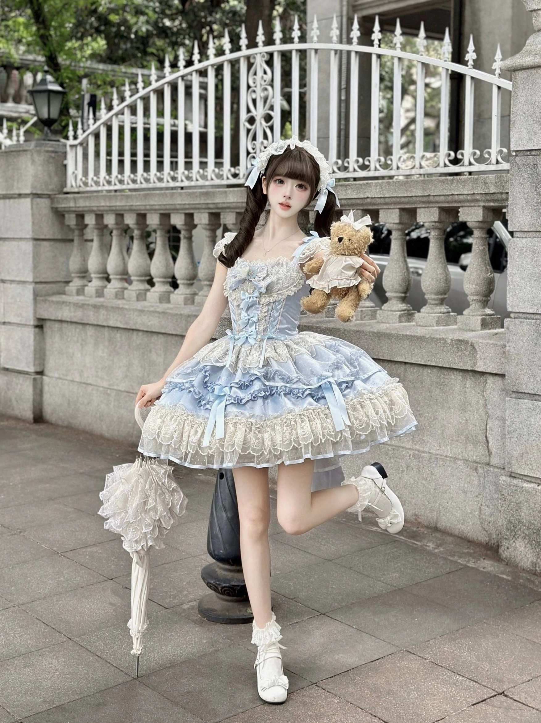 Sweet lolita JSK front bodice detail featuring delicate lace straps, front bow accents, and charming embellishments that define the romantic aesthetic of the Dreamy Butterfly design