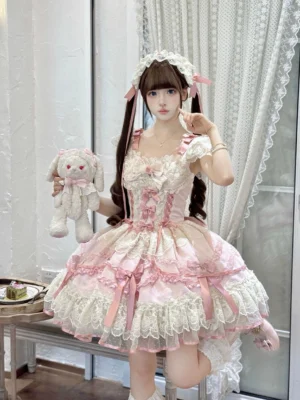 Pink Dreamy Butterfly ballet-style sweet lolita JSK dress front view with twin-tailed hairstyle, lace ruffled hem, front bow accents, matching hair headdress, holding plush rabbit doll