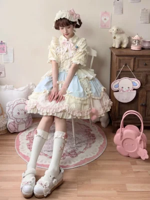 Lolita jumper skirt side view girl sitting on wooden chair wearing layered ruffled skirt with lace accents matching headband and knee-high socks sweet fashion coordinate