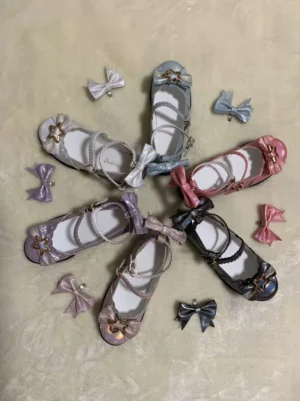 Dreamy starry sweet lolita mary jane shoes collection flat lay multiple color variants with detachable matching bow accessories displayed on fuzzy mat
