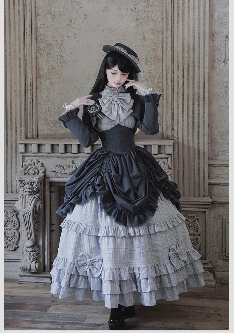 Duke of Victoria classic lolita coordinate set gray-blue striped skirt front three-quarter view with ruffled bustle overskirt bow necktie and top hat aristocratic aesthetic