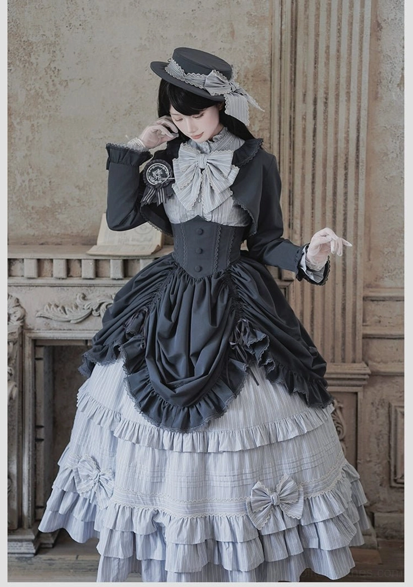 Duke of Victoria classic lolita dress dark navy corset waist side three-quarter pose layered ruffled overskirt striped underskirt bow accents formal hat accessory