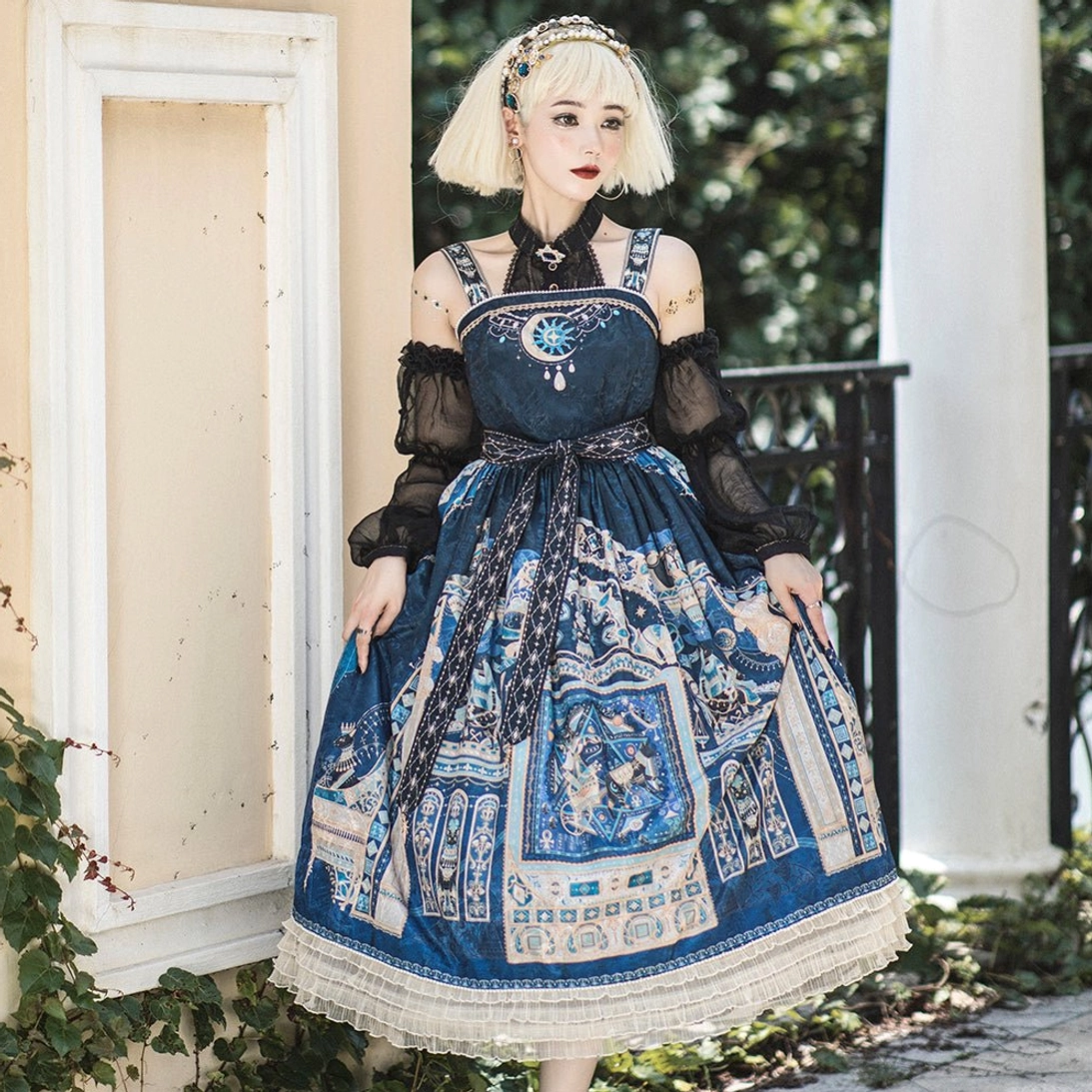 Egyptian casual Lolita JSK dress in cyan featuring celestial print and tiered lace flounce front full-body view