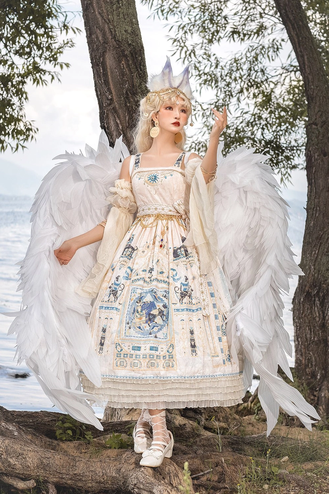 Ivory cream Egyptian Lolita JSK full figure view showing elegant silhouette and celestial print distribution