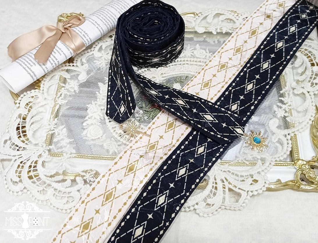 Matching waist sash belt accessories for Egyptian Lolita JSK flat lay overhead view on vintage lace