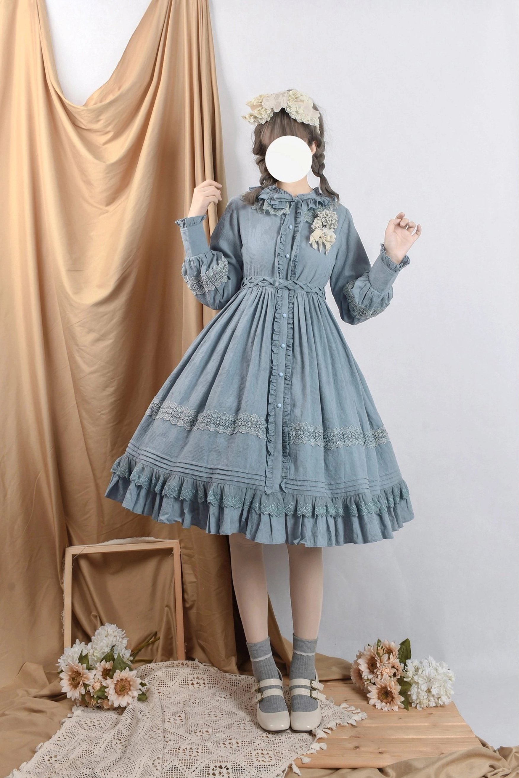 dusty blue lolita op dress full body front view braided hair model wooden floor flower props front button placket floral brooch