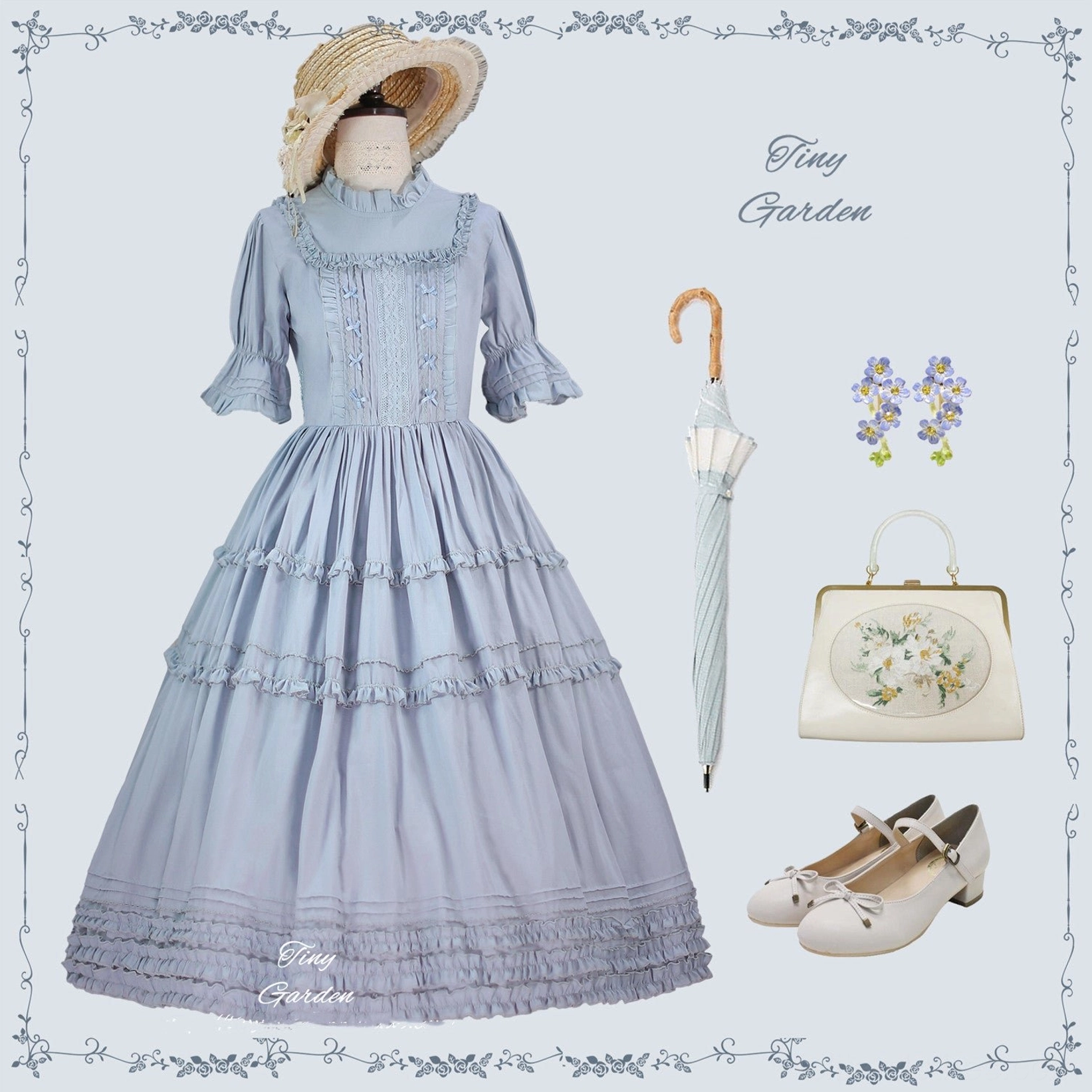 Dusty blue vintage lolita dress flat lay display with coordinate accessories including floral straw hat folding umbrella hair clips leather shoes