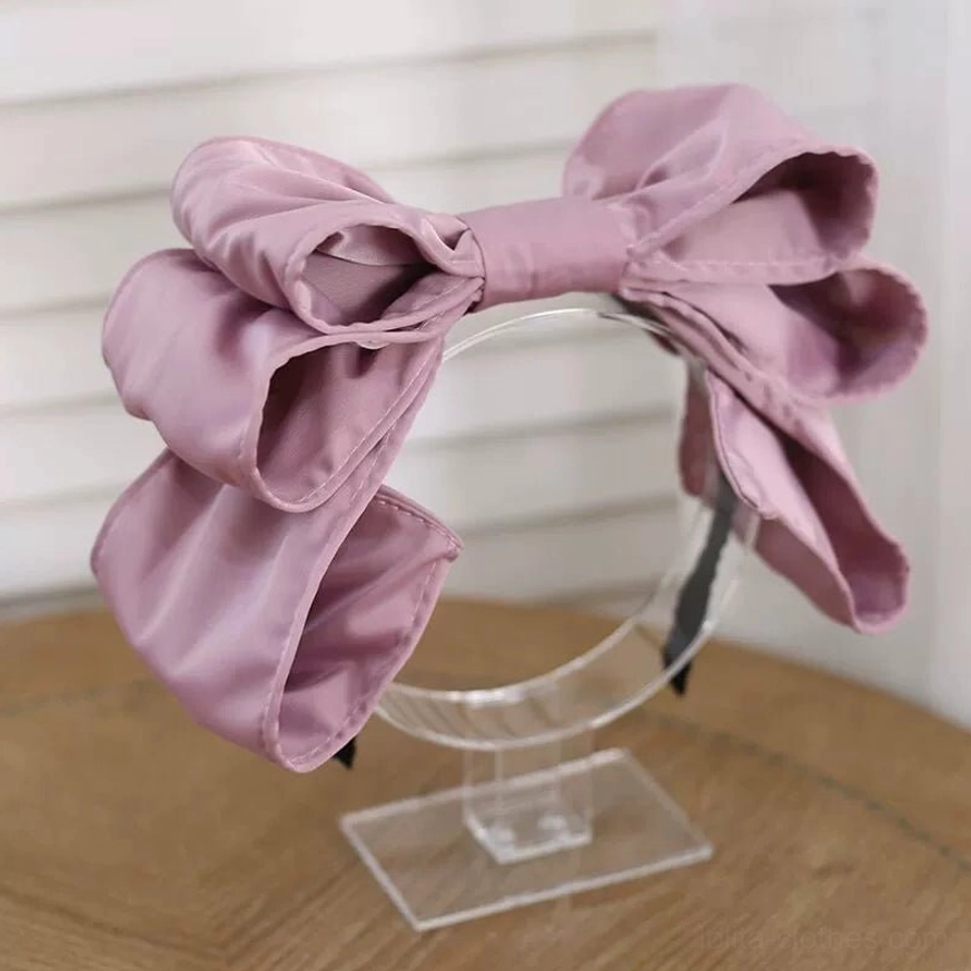 Dusty rose purple oversized satin bow Lolita hair clip on clear acrylic display stand matte satin fabric layered 3D bow shape