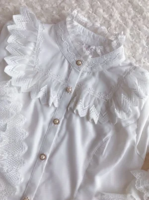 Vintage Edwardian stand collar white chiffon blouse with delicate lace ruffles and gold tone button placket flat lay front view detail shot sweet lolita fashion