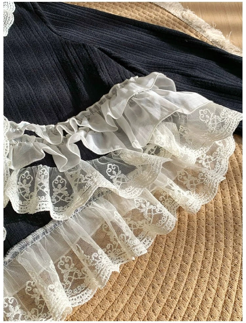 Elegant lolita bolero layered lace ruffles on neckline and cuffs, V-neck design with curved front hem showing refined lace detailing and knit texture