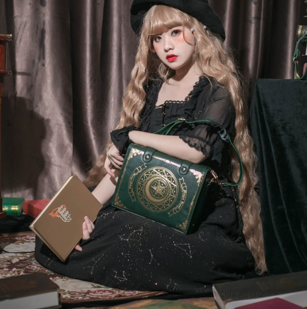 Enchanted book-shaped lolita crossbody clamshell bag with star buckle details and elaborate gold magic circle pattern decoration