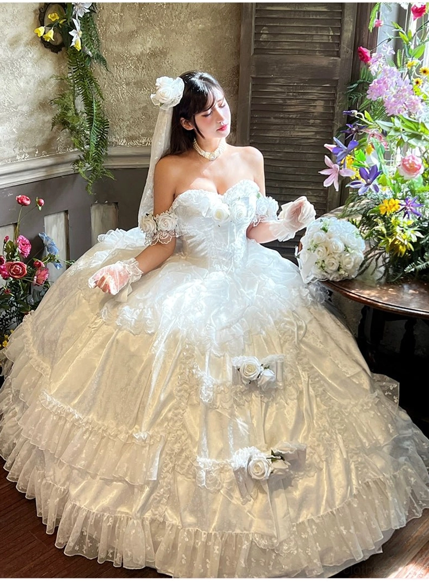 Front close-up full-body shot of white bridal lolita gown with matching opera gloves and rose details