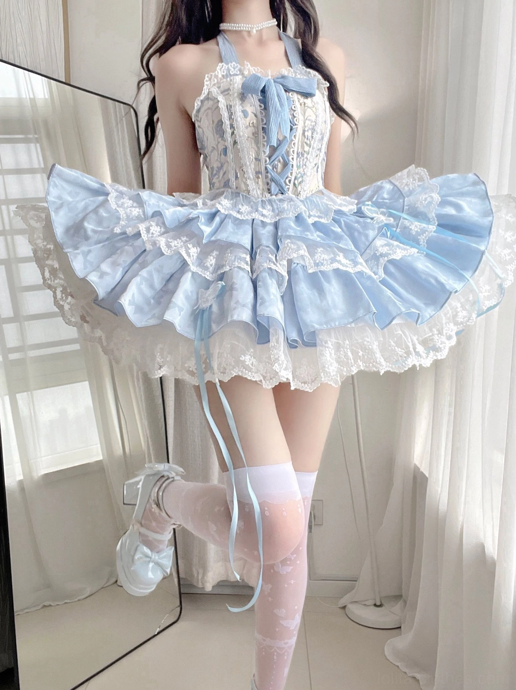 Endless Summer sweet lolita skirt set back three-quarter mirror selfie detachable long satin hanging straps lace-trimmed ruffled skirt white thigh-high stockings worn by long dark-haired model at window