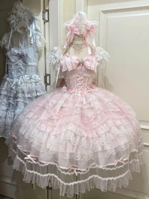 Eternal Vow wedding lolita JSK displayed on mannequin showing pink bridal jumper skirt with layered lace ruffled tulle skirt and satin bust bow