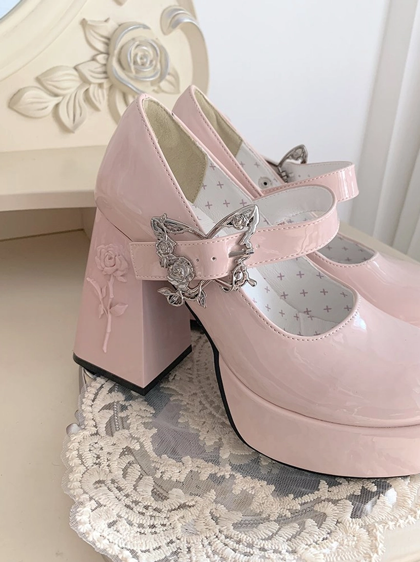Black Mary Jane platform Lolita heels highlighting adjustable ankle strap mechanism with decorative rose-butterfly buckle closure and pu leather material