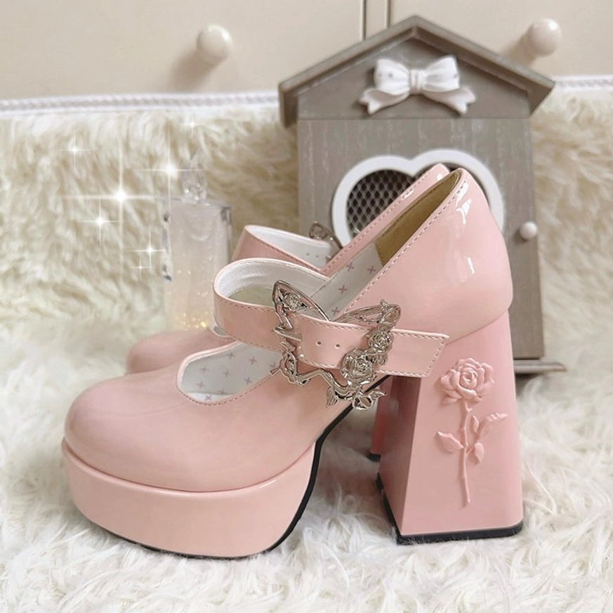 Soft pink patent leather Mary Jane platform Lolita heels with sweet aesthetic design, butterfly buckle detail, and 11cm block heel for elevated styling