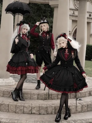 Evil Fang gothic lolita jsk ouji shorts suit black red coordination full group ensemble featuring three models in european courtyard setting