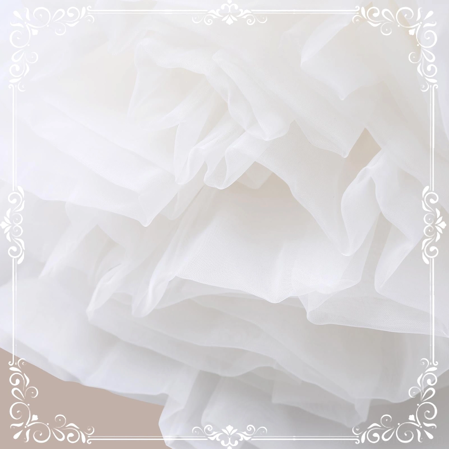 Macro flat lay close-up of extreme puffy lolita petticoat tulle layers showing fluffy stacked ruffled texture and lightweight sheer textile detail