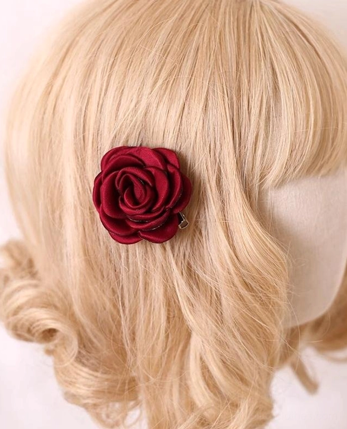 Complete fabric rose brooch and hair clip accessory set showing organza and pearlescent chiffon material quality and construction